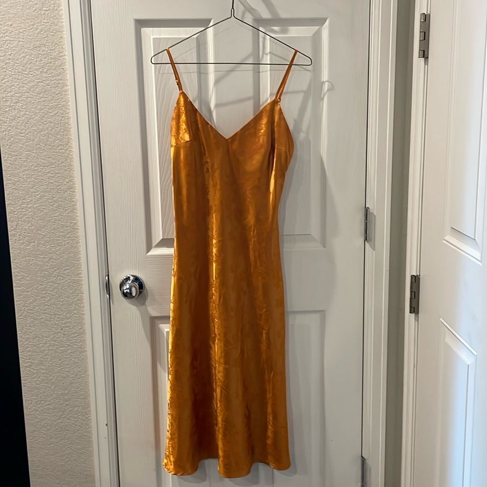 Lulus orangish/rust slip dress with delicate, monochromatic floral design
